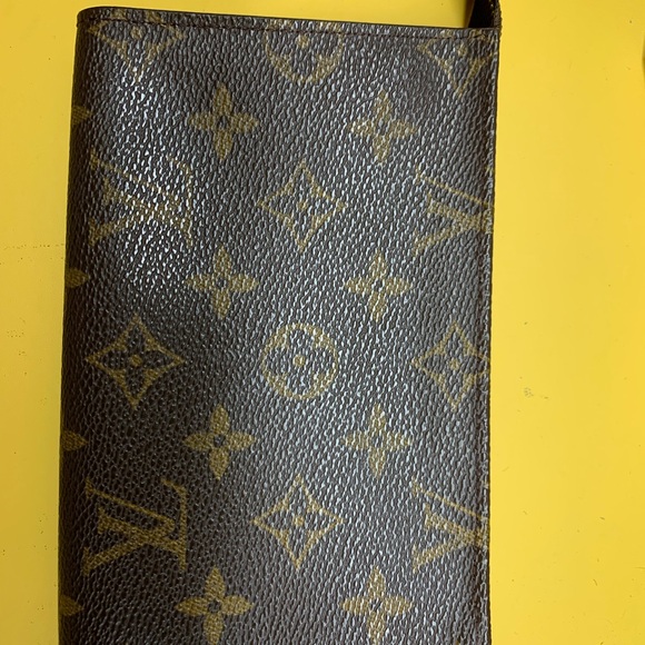 LV's small wristlet is cute to pick up and head to the store.